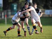 2 March 2011; Ben O'Connor, Newbridge College, is tackled by Ross Keahry and Cillian Guilen, Presentation College, Bray. Vinnie Murray Cup Semi Final, Presentation College, Bray v Newbridge College, Coolmine RFC, Dublin. Picture credit; Matt Browne / SPORTSFILE