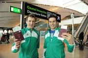 2 March 2011; Irish athletes Darren McBrearty, left, Letterkenny AC, who competes in the Men's 800m, and Brian Gregan, Clonliffe Harriers AC, who competes in the Men's 400m, at Dublin Airport before their departure for the European Indoor Athletics Championships taking place in Paris this weekend. Dublin Airport, Dublin. Picture credit: Brendan Moran / SPORTSFILE