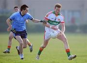 3 March 2011; Kevin Meaney, Carlow I.T, in action against Gerard McCartan, UUJ. Ulster Bank Sigerson Cup Football Quarter-Final, Carlow I.T. v UUJ, Castle Pitch, UCD, Belfield, Dublin. Picture credit: Matt Browne / SPORTSFILE