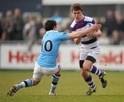 4 March 2011; David Quirke, Clongowes Wood College SJ, is tackled by Bobby Holland, St. Michael’s College. Powerade Leinster Schools Senior Cup Semi-Final, St. Michael’s College v Clongowes Wood College SJ, Donnybrook Stadium, Donnybrook, Dublin. Picture credit: Stephen McCarthy / SPORTSFILE