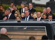 21 October 2016; Former Munster and Ireland player Mick Galwey looks on as the hearse arrives for the funeral of Munster Rugby head coach Anthony Foley at the St. Flannan’s Church, Killaloe, Co Clare. The Shannon club man, with whom he won 5 All Ireland League titles, played 202 times for Munster and was capped for Ireland 62 times, died suddenly in Paris on November 16, 2016 at the age of 42. Photo by Stephen McCarthy/Sportsfile
