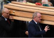 21 October 2016; Former Munster players John Langford and Mick Galwey carry the coffin of Munster Rugby head coach Anthony Foley leaves the St. Flannan’s Church, Killaloe, Co Clare. The Shannon club man, with whom he won 5 All Ireland League titles, played 202 times for Munster and was capped for Ireland 62 times, died suddenly in Paris on November 16, 2016 at the age of 42. Photo by Stephen McCarthy/Sportsfile