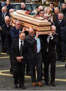 21 October 2016; Former Munster players, from left, John Langford, Mick Galwey, Peter Clohessy and Keith Wood carry the coffin of Munster Rugby head coach Anthony Foley at the St. Flannan’s Church, Killaloe, Co Clare. The Shannon club man, with whom he won 5 All Ireland League titles, played 202 times for Munster and was capped for Ireland 62 times, died suddenly in Paris on November 16, 2016 at the age of 42. Photo by Brendan Moran/Sportsfile