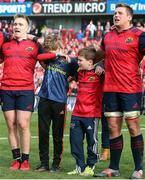 22 October 2016; The sons of the late Munster Rugby head coach Anthony Foley, Tony and Dan, along with Munster players Rory Scannell (L) and CJ Stander, sing 'Stand Up and Fight' on the pitch after the European Rugby Champions Cup Pool 1 Round 2 match between Munster and Glasgow Warriors at Thomond Park in Limerick. The Shannon club man, with whom he won 5 All Ireland League titles, played 202 times for Munster and was capped for Ireland 62 times, died suddenly in Paris on November 16, 2016 at the age of 42. Photo by Brendan Moran/Sportsfile