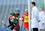 6 March 2011; Grace McMullan, left, Eoghan Rua, celebrates with team-mate Hannah Eastwood after scoring her side's first goal. All-Ireland Intermediate Camogie Club Championship Final, Eoghan Rua v The Harps, Croke Park, Dublin. Picture credit: Brian Lawless / SPORTSFILE