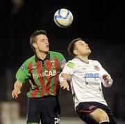 7 March 2011; Mark Quigley, Dundalk, in action against Johnny Taylor, Glentoran. Setanta Sports Cup Quarter-Final First Leg, Glentoran v Dundalk, The Oval, Belfast, Co. Antrim. Picture credit: Oliver McVeigh / SPORTSFILE