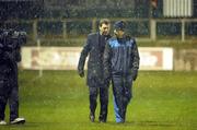 11 March 2011; Monaghan Utd's new manager Roddy Collins, left, makes his way to the dug-out alongside assistant manager Aidan Lynch for the start of the game. Airtricity League First Division, Monaghan United v Waterford United, Gortakeegan, Monaghan. Picture credit: Philip Fitzpatrick / SPORTSFILE