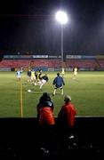 7 November 2001; Two local schoolboys watch on during an Iranian squad training session in the Carlisle Grounds in Bray, Wicklow. Photo by Brendan Moran/Sportsfile