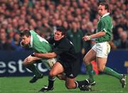 17 November 2001; Brian O'Driscoll of Ireland in action against Aaron Mauger of New Zealand during the International Friendly match between Ireland and New Zealand at Lansdowne Road in Dublin. Photo by Matt Browne/Sportsfile