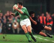 17 November 2001; David Wallace of Ireland in action against Doug Howlett of New Zealand during the International Friendly match between Ireland and New Zealand at Lansdowne Road in Dublin. Photo by Matt Browne/Sportsfile