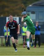 22 October 2016; Tom Fox of Ireland in action against Barry MacDonald of Scotland during the 2016 U21 Hurling/Shinty International Series match between Ireland and Scotland at Bught Park in Inverness, Scotland. Photo by Piaras Ó Mídheach/Sportsfile