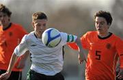 16 March 2011; Luke Evans, Ireland, in action against Lars Conijn, Holland. CP Invitational Tournament, Ireland v Holland, Peaumount FC, Greenogue, Newcastle, Co. Dublin. Picture credit: David Maher / SPORTSFILE