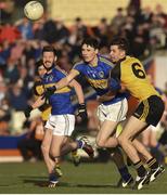 30 October 2016; Ciaran Higgins of Maghery Sean MacDiarmada in action against Brian O'Connell of Ramor United during the AIB Ulster GAA Football Senior Club Championship quarter-final game between Maghery Seán MacDiarmada and Ramor United at Athletic Grounds in Armagh. Photo by Philip Fitzpatrick/Sportsfile