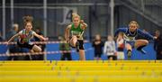 20 March 2011; Niamh Gowing, Dundrum South AC, Dublin, Anne Corcoran, Ferrybank AC, Co. Waterford, and Molly Scott, St Lawerence O'Toole AC, Co. Carlow, in action during the U13 girls 60 metres hurdles. Woodie’s DIY National Juvenile Indoor Championships, Meadowbank Indoor Arena, Magherafelt, Derry. Picture credit: Oliver McVeigh / SPORTSFILE