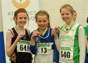 19 March 2011; Competitors, from left to right, Arlene Crossan, Glaslough Harriers, 2nd place, Molly Scott, St Lawerence O'Toole AC, 1st place, and Aisling Keady-Cummins, Craughwell, 3rd place, with their medals after the U13 Girls Long Jump. Woodie’s DIY National Juvenile Indoor Championships, Meadowbank Indoor Arena, Magherafelt, Derry. Picture credit: Oliver McVeigh / SPORTSFILE
