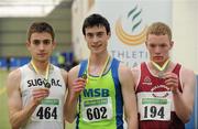 19 March 2011; U19 Boys 1500m winner Peter Gaffney, Metro / St. Brigids, Dublin, centre, with second place Killian O'Connor, Sligo AC, left, and third place Adam Daly, Mullingar Harriers, Co. Westmeath. Woodie’s DIY National Juvenile Indoor Championships, Meadowbank Indoor Arena, Magherafelt, Derry. Picture credit: Oliver McVeigh / SPORTSFILE