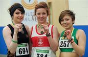 19 March 2011; U19 Girls 400m winner Tara Hession, Galway City Ramblers, centre, with second place Monica O'Connor, Letterkenny AC, Co. Donegal, left, and third place Mellina Van Der Valk, Ferrybank AC, Co. Waterford. Woodie’s DIY National Juvenile Indoor Championships, Meadowbank Indoor Arena, Magherafelt, Derry. Picture credit: Oliver McVeigh / SPORTSFILE