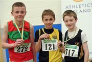 19 March 2011; U13 Boys 600m winner Luke Fitzpatrick, Kilkenny City Harriers, centre, with second place Eoin Looney, Kilmurray Ibrickane AC, Co. Limerick, left, and third place Michael McGrory, Letterkenny, Co. Donegal. Woodie’s DIY National Juvenile Indoor Championships, Meadowbank Indoor Arena, Magherafelt, Derry. Picture credit: Oliver McVeigh / SPORTSFILE