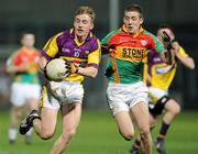 23 March 2011; Liam Og McGovern, Wexford, in action against Jason Kane, Carlow. Cadbury Leinster GAA Football Under 21 Championship Semi-Final, Carlow v Wexford, O'Moore Park, Portlaoise, Co. Laois. Picture credit: Matt Browne / SPORTSFILE