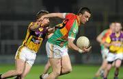23 March 2011; Darragh Foley, Carlow, in action against Liam Og McGovern, Wexford. Cadbury Leinster GAA Football Under 21 Championship Semi-Final, Carlow v Wexford, O'Moore Park, Portlaoise, Co. Laois. Picture credit: Matt Browne / SPORTSFILE