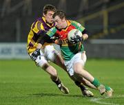 23 March 2011; Jamie Kenny, Carlow, in action against Kevin O'Grady, Wexford. Cadbury Leinster GAA Football Under 21 Championship Semi-Final, Carlow v Wexford, O'Moore Park, Portlaoise, Co. Laois. Picture credit: Matt Browne / SPORTSFILE