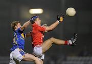 23 March 2011; Jamie Wall, Cork, in action against Michael O'Dwyer, Tipperary. Cadbury Munster GAA Football Under 21 Championship Semi-Final, Cork v Tipperary, Pairc Ui Rinn, Cork. Picture credit: Stephen McCarthy / SPORTSFILE