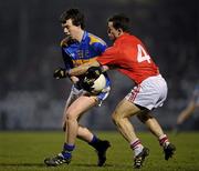 23 March 2011; Liam Boland, Tipperary, in action against Alan Cronin, Cork. Cadbury Munster GAA Football Under 21 Championship Semi-Final, Cork v Tipperary, Pairc Ui Rinn, Cork. Picture credit: Stephen McCarthy / SPORTSFILE