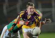 23 March 2011; Liam Og McGovern, Wexford, in action against Paul McElligot, Carlow. Cadbury Leinster GAA Football Under 21 Championship Semi-Final, Carlow v Wexford, O'Moore Park, Portlaoise, Co. Laois. Picture credit: Matt Browne / SPORTSFILE