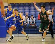 24 March 2011; Seamus Brosnan, Castleisland Community College, Castleisland, Co. Kerry, in action against Donal Greene, Calasanctius College, Oranmore, Co. Galway. Basketball Ireland Boys U19A Schools League Final, Calasanctius College, Oranmore, Co. Galway v Castleisland Community College, Castleisland, Co. Kerry, National Basketball Arena, Tallaght, Co. Dublin. Picture credit: Barry Cregg / SPORTSFILE