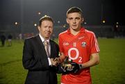 23 March 2011; Mark Collins, Cork, is presented with his Man of the Match award by Joe Murphy, Business Development Manager Cadburys Ireland. Cadbury Munster GAA Football Under 21 Championship Semi-Final, Cork v Tipperary, Pairc Ui Rinn, Cork. Picture credit: Stephen McCarthy / SPORTSFILE