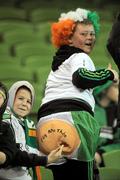 29 March 2011; Two young supporters at the match. International Friendly, Republic of Ireland v Uruguay, Aviva Stadium, Lansdowne Road, Dublin. Picture credit: Brian Lawless / SPORTSFILE