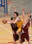 1 April 2011; Daniel James, UCD, in action against Darren Callanan, right, and Dylan Cunningham, NUIG. Basketball Intervarsities Championships 2011, Men's A, Pool 1, University College Dublin v National University of Ireland, Galway, University College Dublin, Belfield, Dublin. Picture credit: Brian Lawless / SPORTSFILE