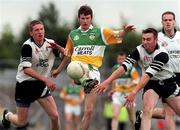 2 August 1998; Gary Comerford of Offaly is tackled by Jimmy Hayes and Keith Carty, right, of Sligo during the All-Ireland Junior Football Championship Semi-Final between Offaly and Sligo at Dr Hyde Park in Roscommon. Photo by Matt Browne/Sportsfile