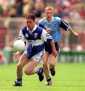 2 August 1998; Jamie Moran of Laois gets away from Graham Norton of Dublin during the Leinster Minor Football Championship Final match between Laois and Dublin at Croke Park in Dublin. Photo by Ray McManus/Sportsfile