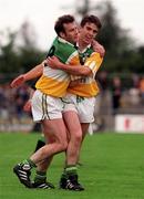2 August 1998; Offaly players Denis Kelly, left, and John Hurst celebrate following the All-Ireland Junior Football Championship Semi-Final between Offaly and Sligo at Dr Hyde Park in Roscommon. Photo by Brendan Moran/Sportsfile