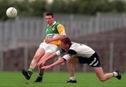 2 August 1998; Paddy Connolly of Offaly is tackled by Jimmy Hayes of Sligo during the All-Ireland Junior Football Championship Semi-Final between Offaly and Sligo at Dr Hyde Park in Roscommon. Photo by Matt Browne/Sportsfile