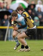 2 April 2011; Lorcan Bourke, Garryowen, is tackled by Matthew Costelloe, Young Munster. Ulster Bank League Division 1A, Young Munster v Garryowen, Tom Clifford Park, Rosbrien, Limerick. Picture credit: Diarmuid Greene / SPORTSFILE