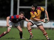 2 April 2011; Alan Bourke, Bruff, in action against Michael Keating, Clontarf. Ulster Bank League Division 1B, Bruff  v Clontarf, Kilballyowen Park, Bruff, Co Limerick. Picture credit: Ken Sutton / SPORTSFILE