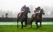 20 November 2016; Identity Thief, right, with Bryan Cooper up, battles with second placed Oridnary World, with Davy Russell up, on their way to winning the Ryans Cleaning Craddockstown Novice Steeplechase at Punchestown Racecourse in Naas, Co. Kildare. Photo by Ramsey Cardy/Sportsfile