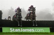 20 November 2016; Identity Thief, right, with Bryan Cooper up, battles with second placed Oridnary World, with Davy Russell up, on their way to winning the Ryans Cleaning Craddockstown Novice Steeplechase at Punchestown Racecourse in Naas, Co. Kildare. Photo by Ramsey Cardy/Sportsfile
