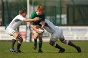 10 April 2011; Conor Joyce, Ireland U18 Clubs, is tackled by Elliott Stooke, left, and Freddie Gabbitass, England U18 Clubs & Schools. Ireland U18 Clubs v England U18 Clubs & Schools, Ashbourne RFC, Ashbourne, Co. Meath. Picture credit: Ray Lohan / SPORTSFILE