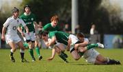 10 April 2011; Thomas Daly, Ireland U18 Clubs, is tackled by Harry Sloan, England U18 Clubs & Schools. Ireland U18 Clubs v England U18 Clubs & Schools, Ashbourne RFC, Ashbourne, Co. Meath. Picture credit: Ray Lohan / SPORTSFILE