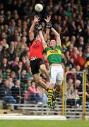 10 April 2011; Dan Gordon, Down, and Kieran Donaghy, Kerry, contest a kick out. Allianz Football League, Division 1, Round 7, Kerry v Down, Fitzgerald Stadium, Killarney, Co. Kerry. Picture credit: Brendan Moran / SPORTSFILE