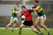 10 April 2011; Mark Poland, Down, in action against Eoin Brosnan, Kerry. Allianz Football League, Division 1, Round 7, Kerry v Down, Fitzgerald Stadium, Killarney, Co. Kerry. Picture credit: Brendan Moran / SPORTSFILE