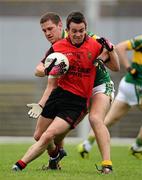 10 April 2011; Mark Poland, Down, in action against Eoin Brosnan, Kerry. Allianz Football League, Division 1, Round 7, Kerry v Down, Fitzgerald Stadium, Killarney, Co. Kerry. Picture credit: Brendan Moran / SPORTSFILE