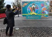 24 November 2016; A general view of a member of the public taking a picture of the Henri Delaunay Cup on display before the UEFA EURO 2020 Host City Logo Launch – Dublin at CHQ Building in North Wall Quay, Dublin. Photo by David Maher/Sportsfile