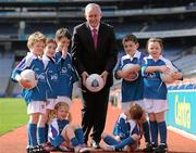 12 April 2011; The 2011 Vhi GAA Cúl Camps were officially launched this morning in Croke Park by Uachtarán Chumann Lúthchleas Gael Criostóir Ó Cuana and Declan Moran of Vhi Healthcare. With over 1,000 camps taking place in Ireland and overseas, and over 83,000 children aged 6-14 years participating, the Vhi GAA Cúl Camps are the most popular children’s sporting camps in the country. Pictured in attendance are Uachtarán CLG Criostóir Ó Cuana with, from left, Conor O'Driscoll, age 7, from Meath, Kate McCarthy, age 6, from Dublin, Charlie McCarthy, age 8, from Dublin, Aoife Donovan, age 6, from Dublin, Aoibheann Collins, age 7, from Limerick, Stephen Carey, age 8, from Kildare, and Mollie Lennon, age 6, from Kilkenny. Vhi GAA Cúl Camps Ambassador Launch 2011, Croke Park, Dublin. Picture credit: Barry Cregg / SPORTSFILE