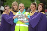 15 April 2011; Rita Lawlor, member of Council of Patrons Special Olympics Ireland, with members of the Dublin Gospel Choir, from left, Joanne McGrath, from Glasnevin, Ruth Treacy, from Ballinlough, Roscommon, Lisa Murrin, from Clontarf, and Emma Farrell, from Coolock, during the Special Olympics Ireland’s annual collection day. This is the biggest annual fundraising event in aid of Special Olympics Ireland. Grafton Street, Dublin. Picture credit: Brian Lawless / SPORTSFILE