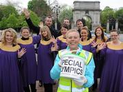 15 April 2011; Rita Lawlor, member of Council of Patrons Special Olympics Ireland, with the Dublin Gospel Choir ahead of their performance, during the Special Olympics Ireland’s annual collection day. This is the biggest annual fundraising event in aid of Special Olympics Ireland. Grafton Street, Dublin. Picture credit: Brian Lawless / SPORTSFILE