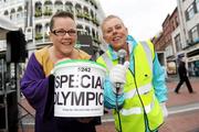 15 April 2011; Rita Lawlor, member of Council of Patrons Special Olympics Ireland, with member of the Dublin Gospel Choir, Joanne McGrath, from Glasnevin, during the Special Olympics Ireland’s annual collection day. This is the biggest annual fundraising event in aid of Special Olympics Ireland. Grafton Street, Dublin. Picture credit: Brian Lawless / SPORTSFILE